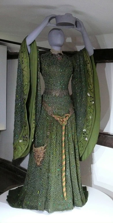 The complete restored beetle-wing dress on a mannequin
