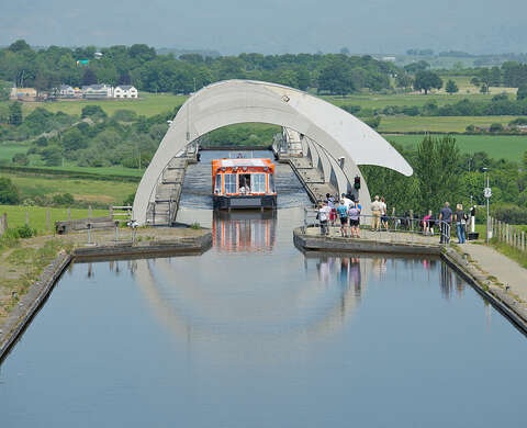 A canal boat in a gondola at the upper end of the Falkirk Wheel