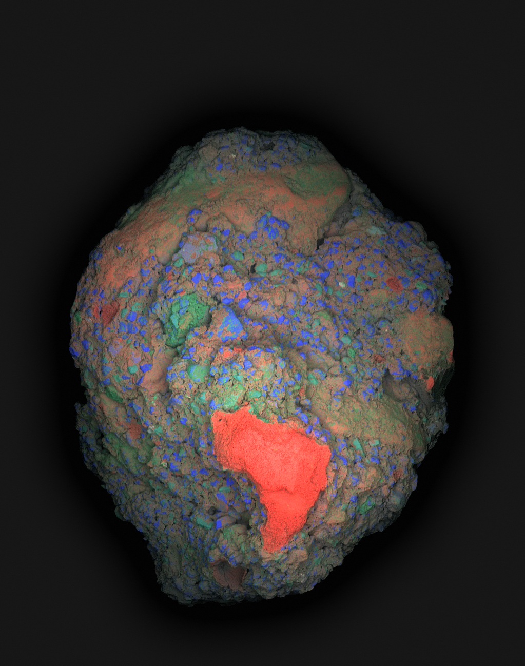 Calcium-rich areas shown in red in the original elemental map — MIT / courtesy of the researchers. Original photograph / elemental map, resized.