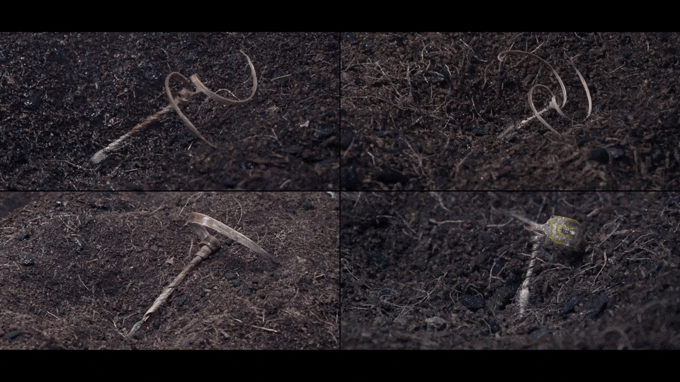 Time-lapse footage of the experimental wooden E-seed carrier burrowing — Carnegie Mellon / Morphing Matter Lab. Original research imagery; experimental device, documentary animation/frame.