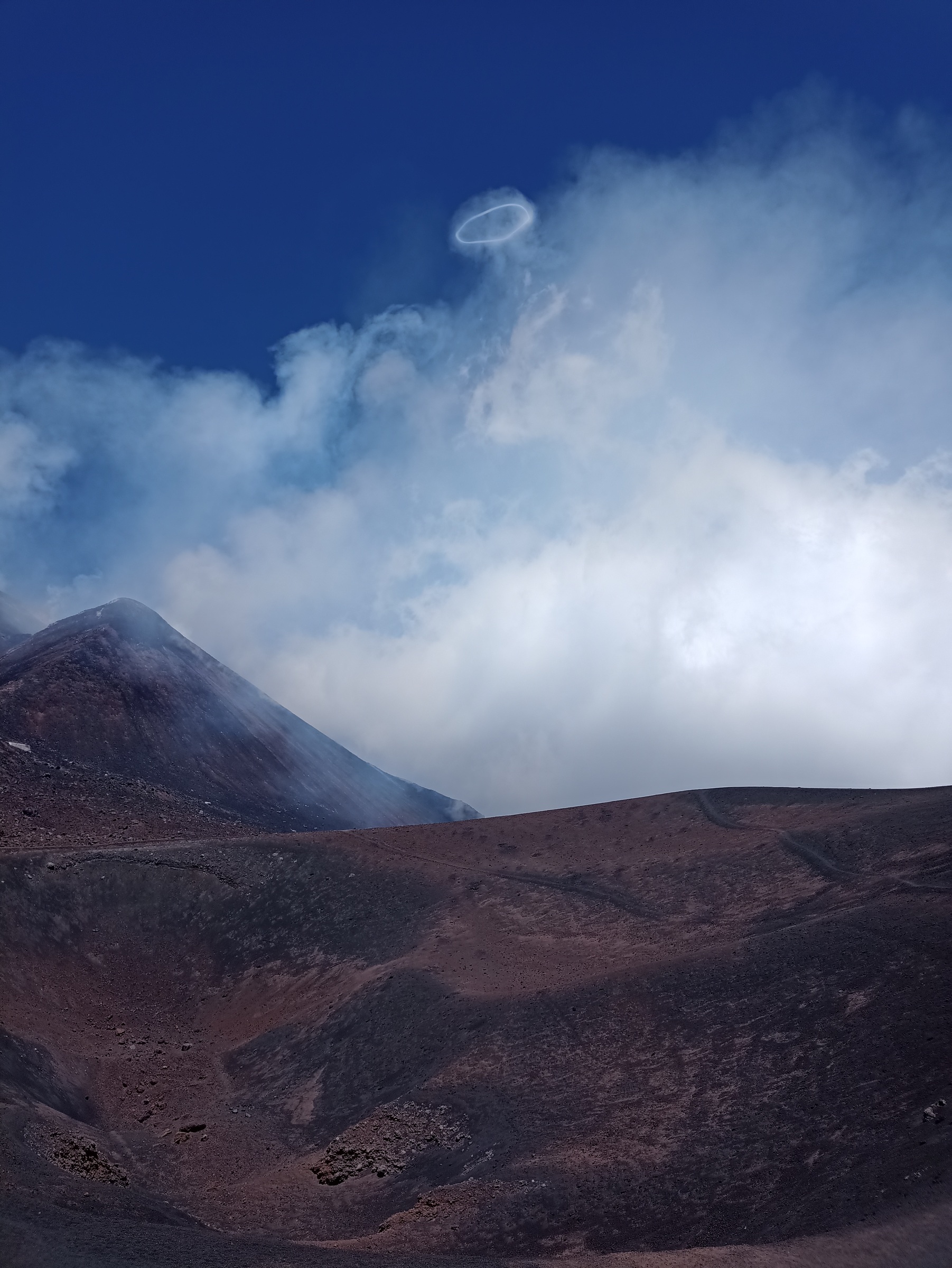 A volcanic vortex ring above Mount Etna, photographed on 1 August 2023