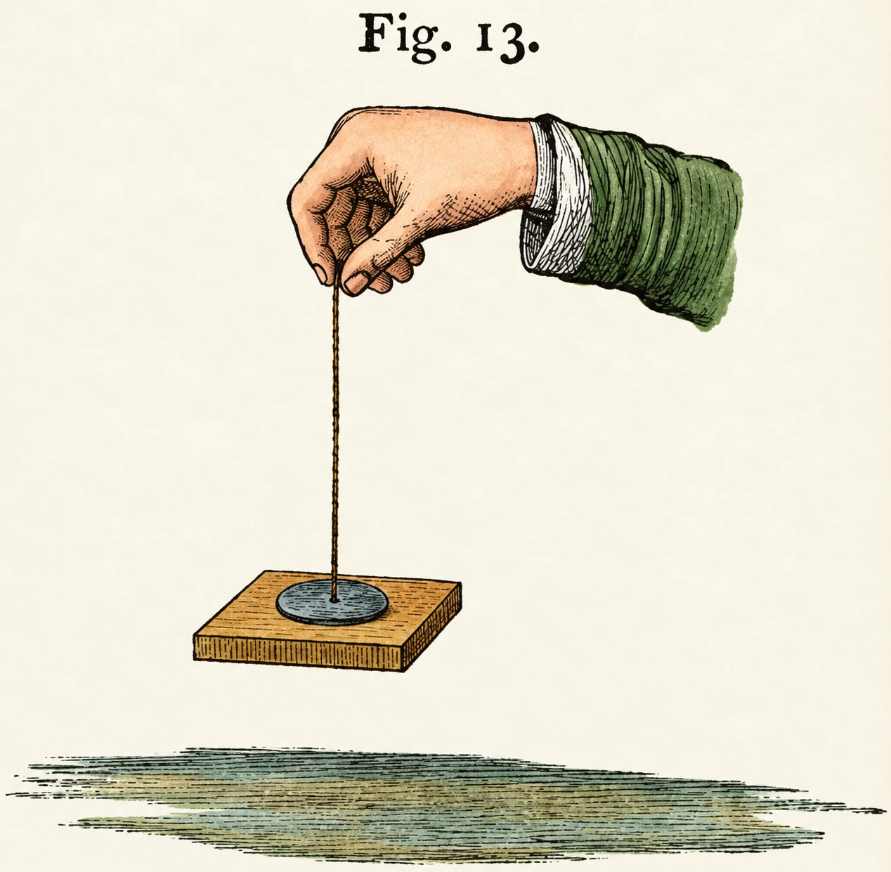 Soaked leather lifting a stone paperweight.
